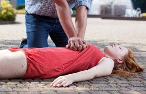 good samaritan laws, man helping fallen woman