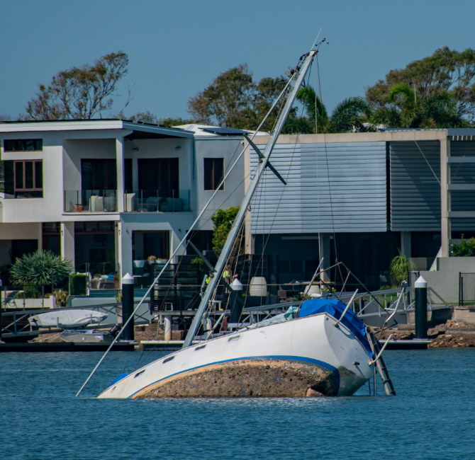 Sailboat capsized near shore